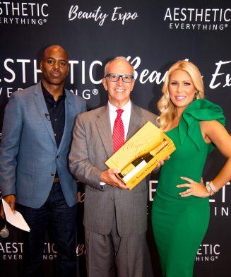 Busic Accepts For Z Wave: "Greatest Utility in an Aesthetic Device" award from Kevin Frazier & Gretchen Rossi