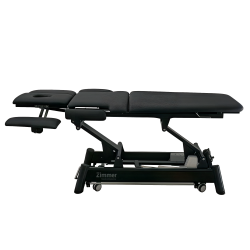 Z Ultimate treatment table with arm supports extended for flexible patient positioning