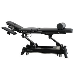 Z Ultimate treatment table with reclined backrest for adjustable patient positioning and clinical treatment access