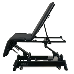 Z Ultimate treatment table with backrest raised showing upright positioning capability